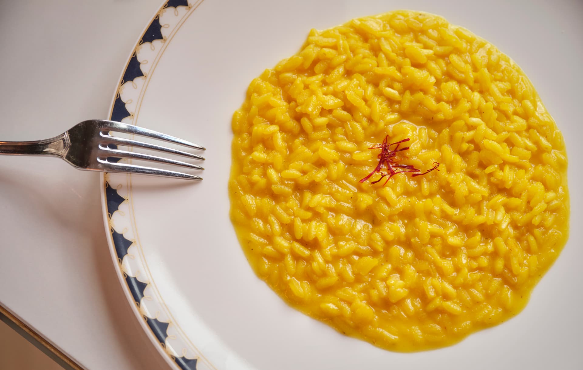Risotto alla Milanese with saffron on Cova porcelain